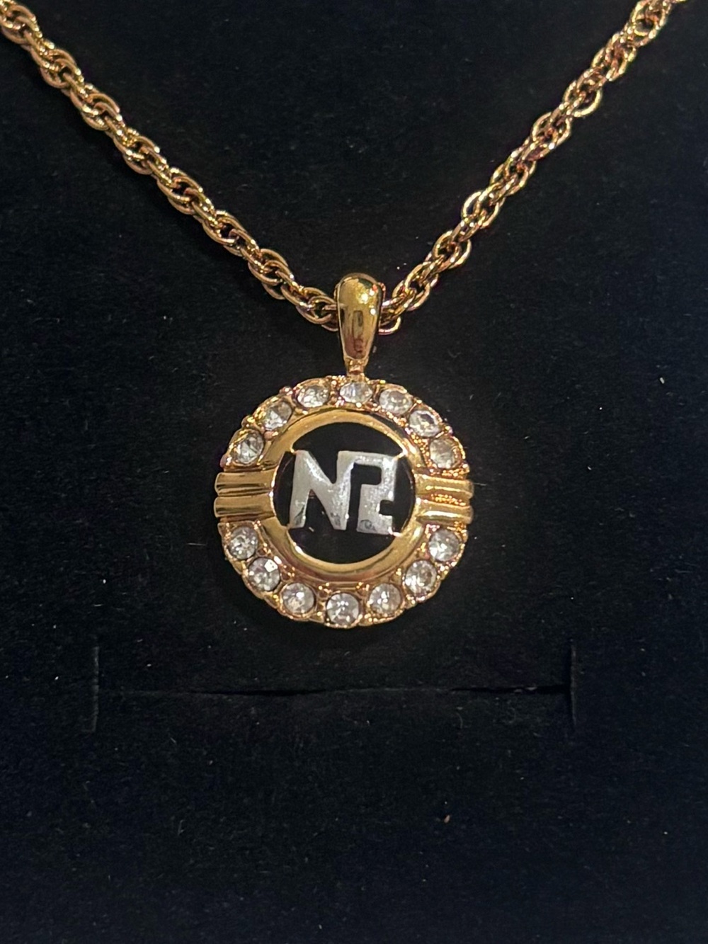 Nina Ricci Gold-Tone Pendant Necklace with Silver Center and Crystal Halo